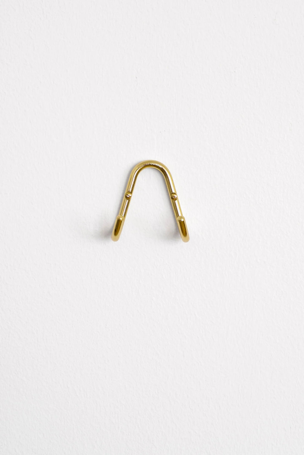 Symmetrisk dobbeltknage / poleret messing